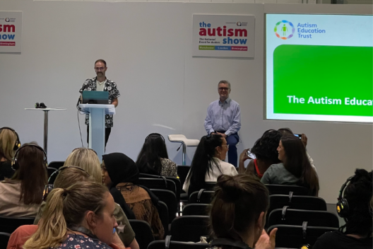 Andrew Cutting, Specialist Exclusions & Alternative Provision Advice Coordinator expert with the National Autistic Society and AET Content Manager, Dean Da Conceicao, on stage at the Autism Show in London.